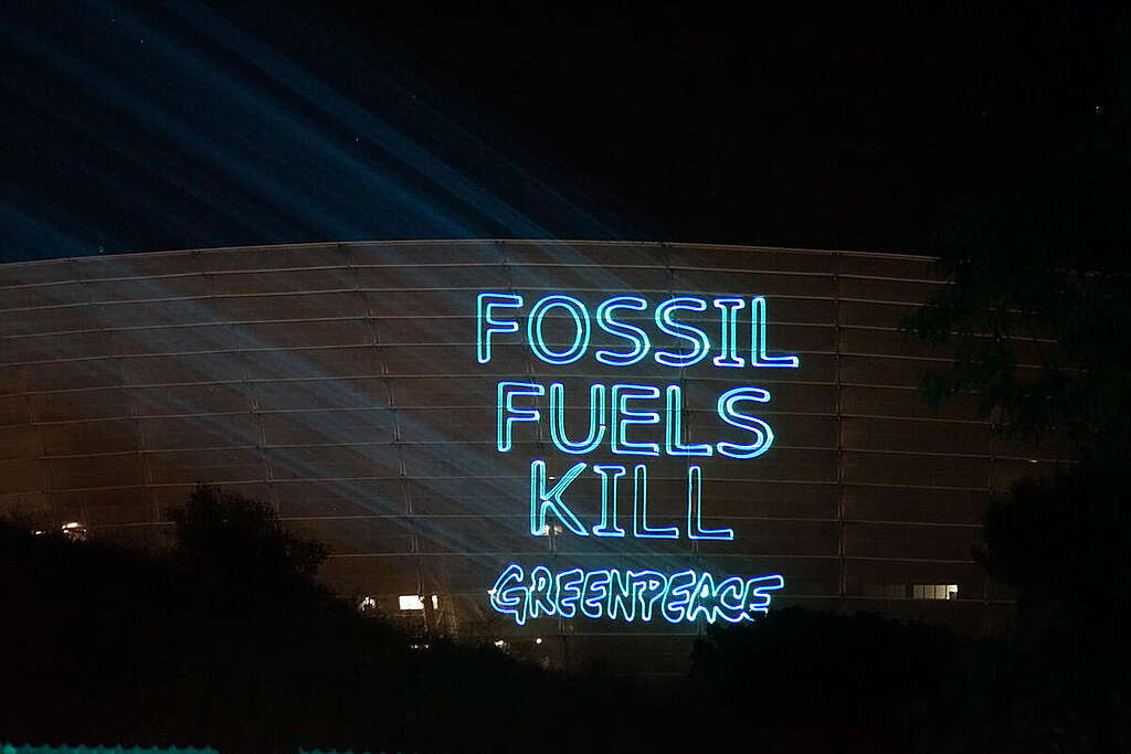 Projection onto Green Point Stadium in Cape Town, South Africa. © Awelani Mudau / Greenpeace Projection onto Green Point Stadium in Cape Town, South Africa. © Awelani Mudau / Greenpeace